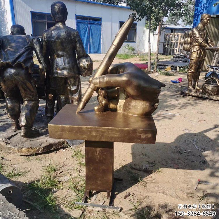 地標(biāo)擺件，手握鋼筆雕塑生產(chǎn)商，戶外景觀雕塑