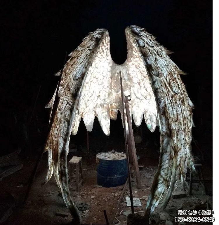 城市翅膀雕塑，網(wǎng)格燈光雕塑，古銅效果