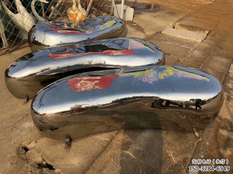 尖草坪坐凳雕塑，小區(qū)園林雕塑，不銹鋼鏡面效果